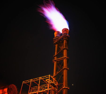 low-angle-view-of-illuminated-tower-against-sky-at-night-327041-c